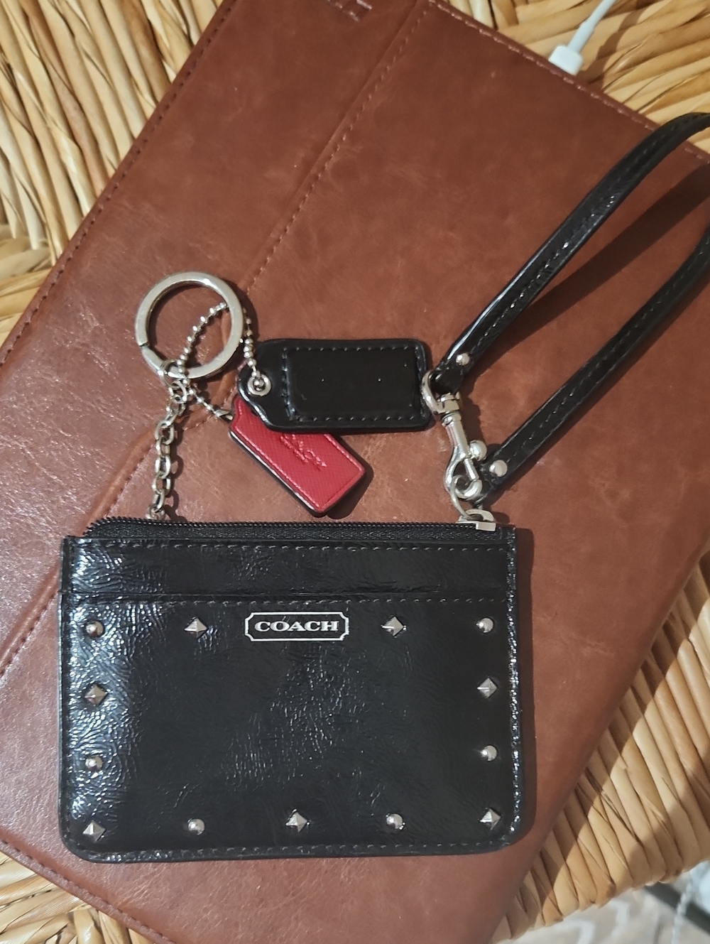 Coach black patent/silver studs ID-CC case. EUC Preloved item sold as is